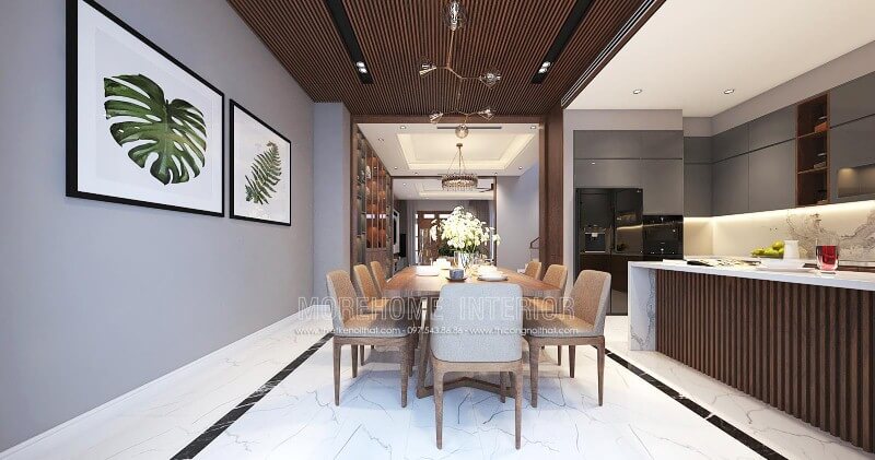 Bộ bàn ghế ăn 8 ghế gỗ óc chó cao cấp cùng chất liệu nệm bọc êm ái được thiết kế tối giản giúp không gian trở nên thông thoáng nhưng không kém phần hiện đại, sang trọng. Thiết kế phòng ăn tại Hà Nội