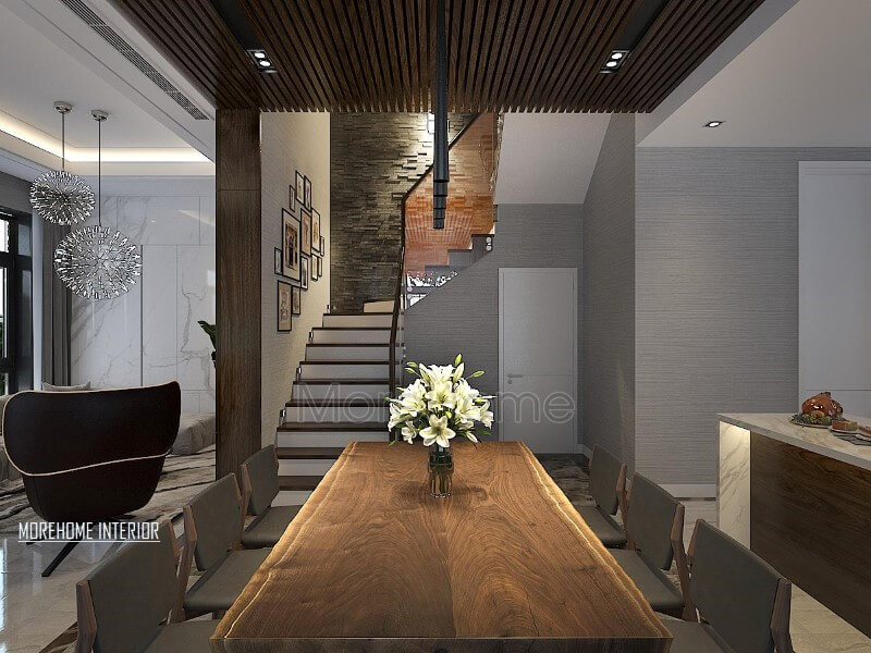 Bàn ăn gỗ óc chó nguyên tấm ấn tượng với đường đối vân độc đáo cùng gamsắc} trầm sang trọng đang trở thành xu hướng trang trí phòng ăn ấn tượng nhất hiện nay. Thiết kế phòng ăn tại Hà Nội