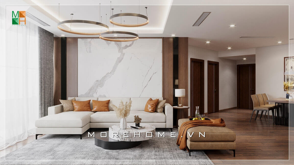 Một bộ sofa gỗ bọc nỉ chữ L, một bàn trà bằng đá nhân tạo với đèn thả kiểu cách, vách tường đá kết hợp cùng gỗ, tất cả tổng thể tạo nên một căn phòng khách vô cùng ấn tượng, thể hiện gu thẩm mỹ tinh tế của gia chủ Đá ốp tường cao cấp