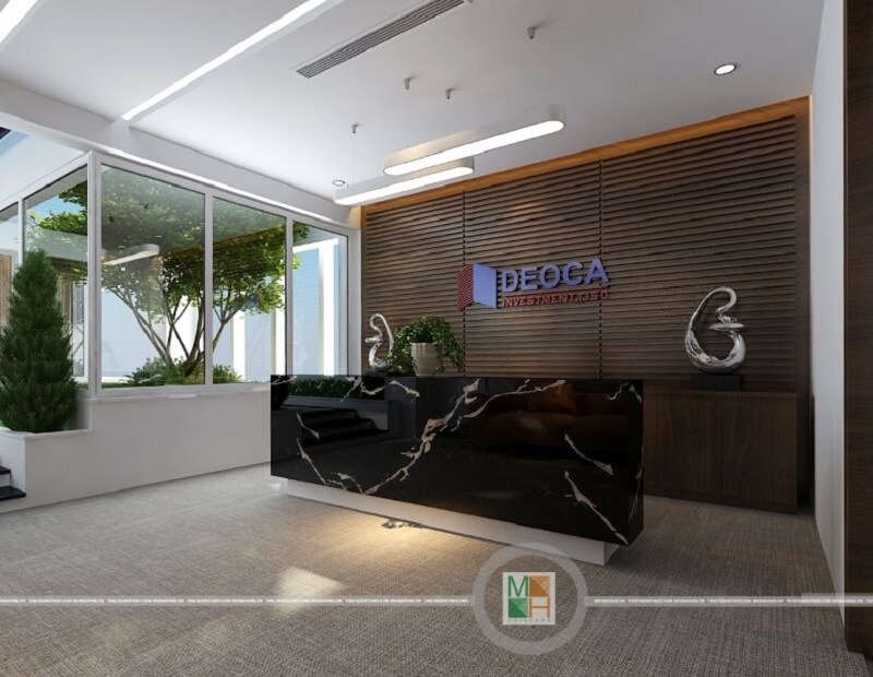 Quầy lễ tân văn phòng công ty Đèo Cả được ốp đá nhân tạo màu đen với những đường vân trắng mang đến một không gian làm việc lí tưởng. đá nhân tạo cao cấp