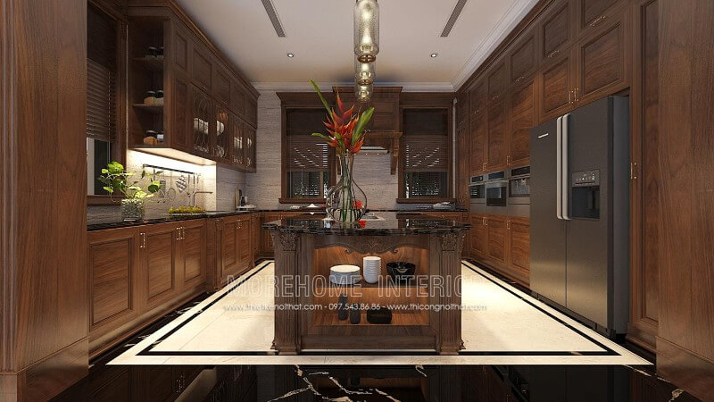 Thiết kế tủ bếp gỗ óc chó tân cổ điển tại Hà Nội kết hợp bàn đảo vừa mang lại độ bền cao, vừa biến một phần nhà bếp thành quầy bar hay bàn ăn phụ thuận tiện Mẫu tủ bếp kết hợp quầy bar