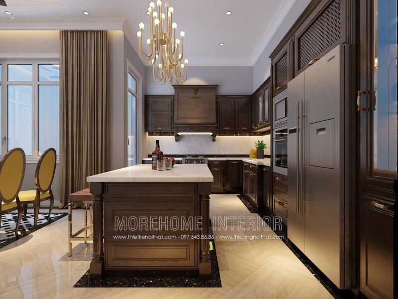 Thiết kế tủ bếp chữ L tận dụng được tối đa mọi góc khuất của căn phòng, chiếc bàn đảo được đặt ở chính giữa là tích hợp của nhiều chức năng như quầy bar, bàn ăn phụ...tạo sự tiện nghi Mẫu tủ bếp kết hợp quầy bar