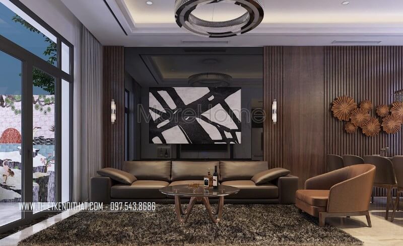 Mặt tường được KTS lựa chọn ốp gỗ veneer cao cấp và mặt kính đen là điểm nhấn cho không gian khi mới bước vào căn nhà Ấn tượng với mẫu thiết kế đá ốp tường phòng khách đẹp