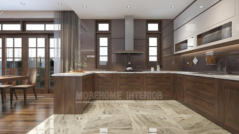 Mẫu tủ bếp màu nâu trầm ấn tượng từ gỗ óc chó, thiết kế liền bàn đảo hiện đại mang lại sự thuận tiện cho gia chủ trong quá trình nấu nướng và bày biện trang trí đồ ăn Mẫu tủ bếp màu nâu trẻ trung, ấm cúng cho căn bếp nhà bạn