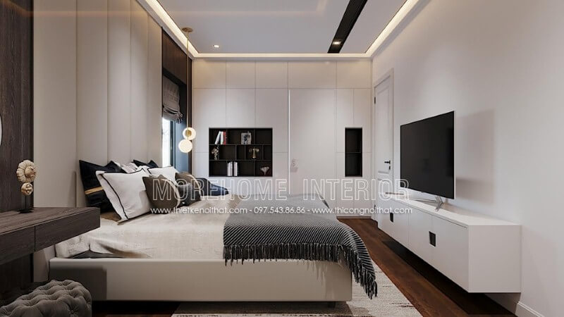 Kệ tivi sơn trắng gỗ công nghiệp ấn tượng với tay nắm âm độc đáo tạo vẻ đẹp sang trọng cho phòng ngủ hiện đại. Thiết kế phòng ngủ tại Hà Nội