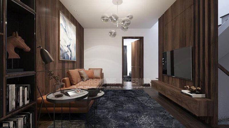 Điểm nhấn sofa da màu cam ấn tượng cho phòng khách hiện đại trang trí tường từ gỗ ốp tối màu. Trang trí phòng khách
